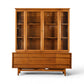Young Manufacturing concave walnut china cabinet front view with sliding glass doors