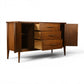 Broyhill Saga credenza with interior drawers open behind cabinet doors