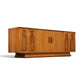 Specialty Woodcraft sculpted walnut and burl credenza angle view