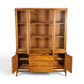 Broyhill Brasilia walnut china cabinet doors open with center drawer pulled out