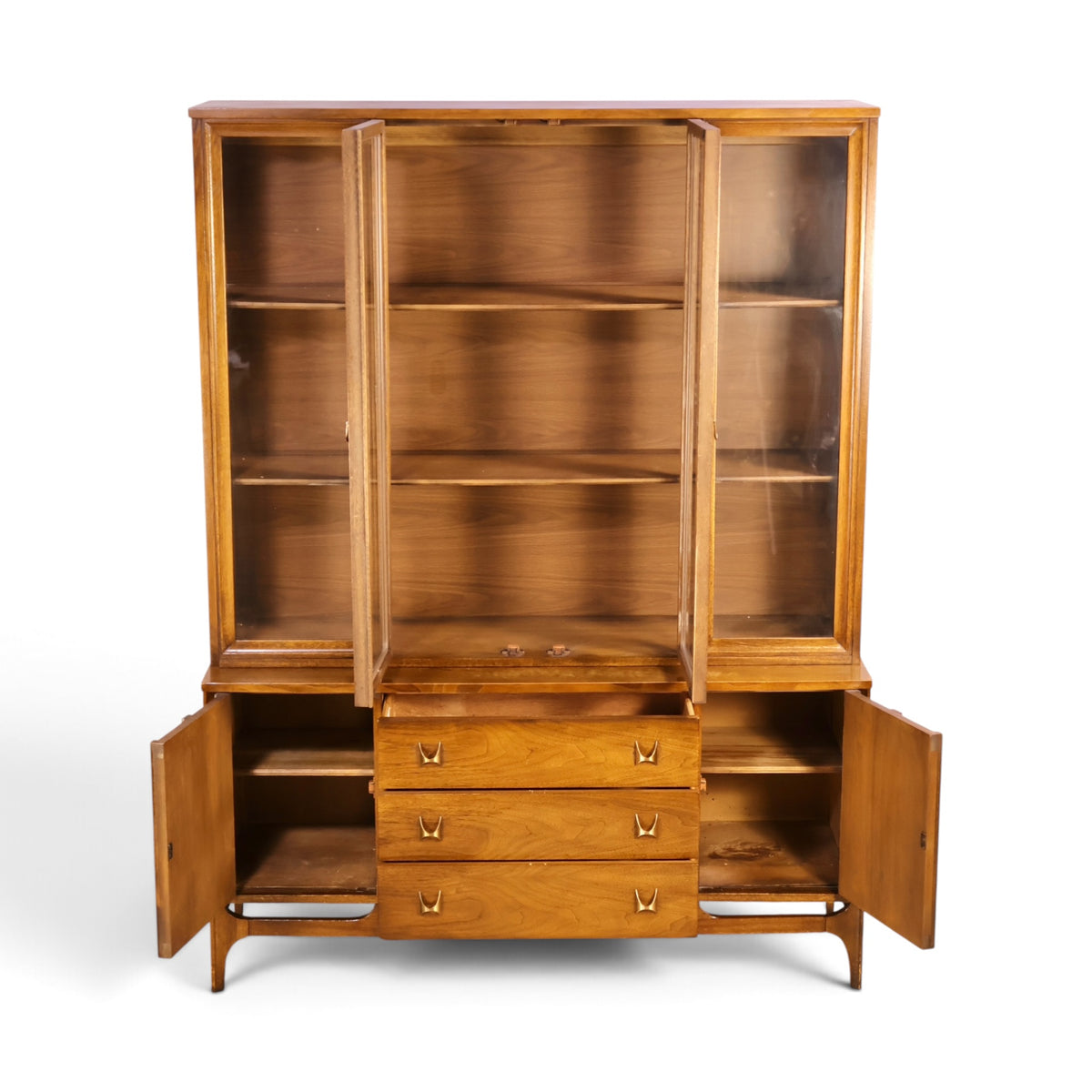 Broyhill Brasilia walnut china cabinet doors open with center drawer pulled out