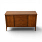 Broyhill Saga mid century credenza angled front view on tapered legs
