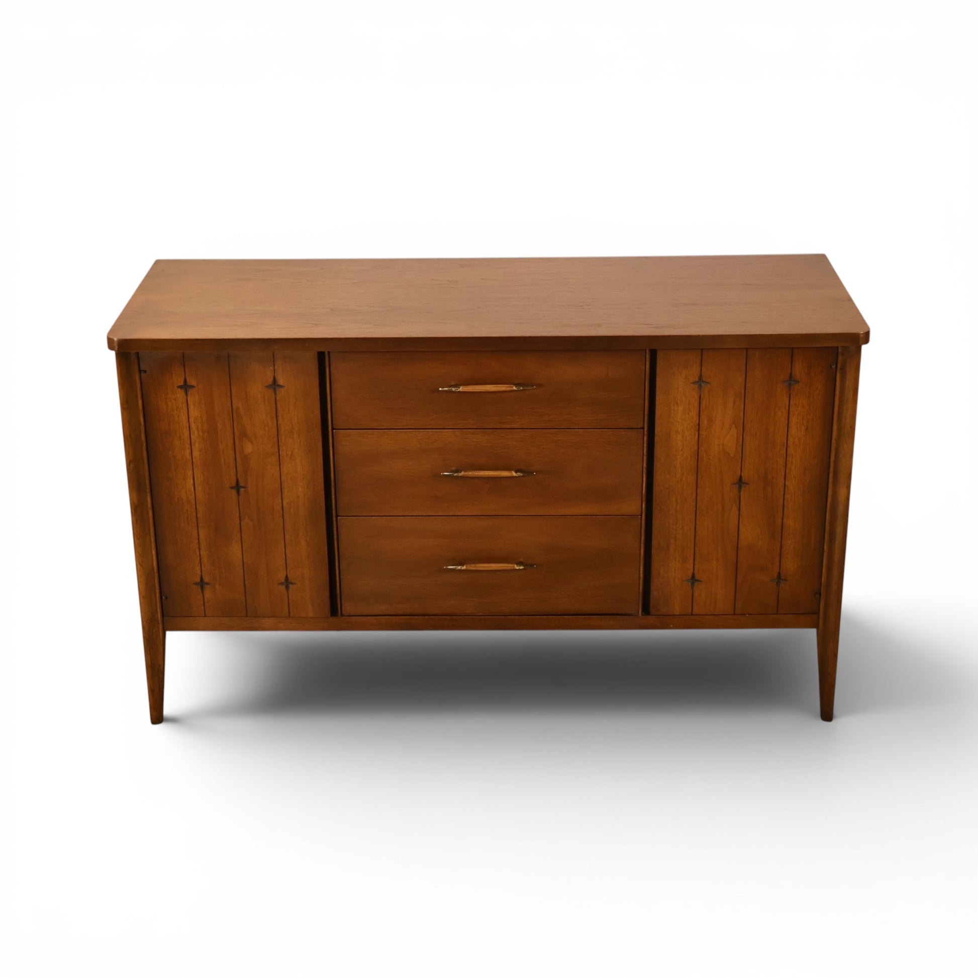 Broyhill Saga mid century credenza angled front view on tapered legs