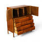 Edmond Spence highboy dresser with doors and drawers open