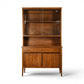 Broyhill Saga petite walnut china cabinet front view with sliding glass doors and star inlay base