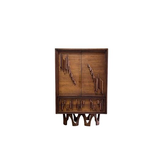 Mid-century modern walnut armoire with vintage charm and ample storage space.