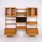 Poul Cadovius Cado wall unit front view with glass display cabinets, record divider cabinet, and slanted shelves