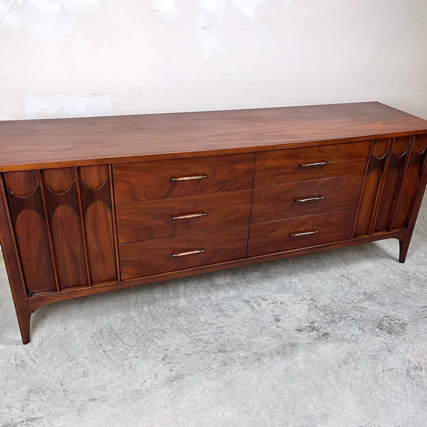 Walnut woodgrain Kent Coffey Perspecta dresser with brass and wooden accents