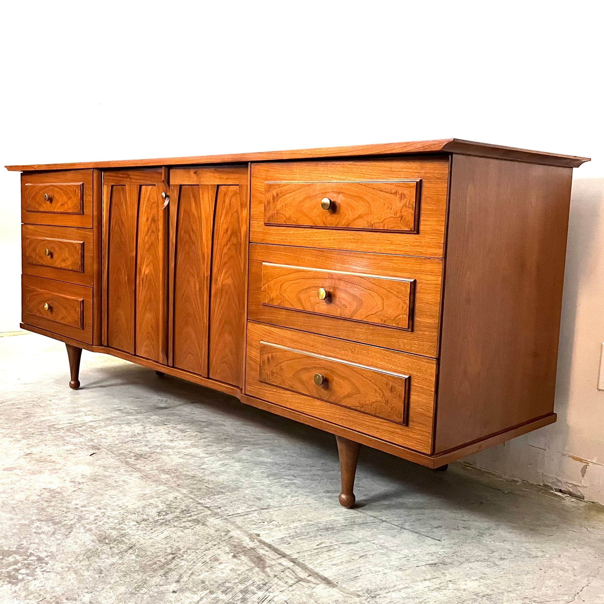 Vintage Concave Mid Century Modern Longboy 9 Drawer Dresser c. 1960s Vintage Concave Mid Century Modern Longboy 9 Drawer Dresser c. 1960s