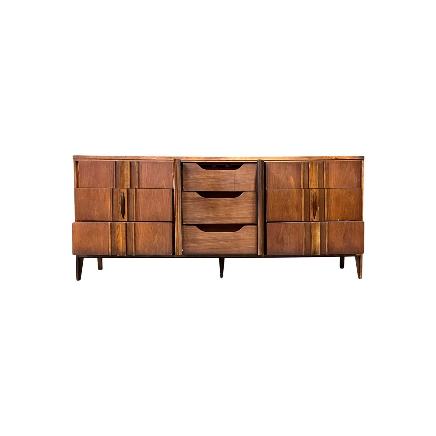 Thomasville vintage dresser from the 1960s, featuring ribbed facade and solid walnut accents