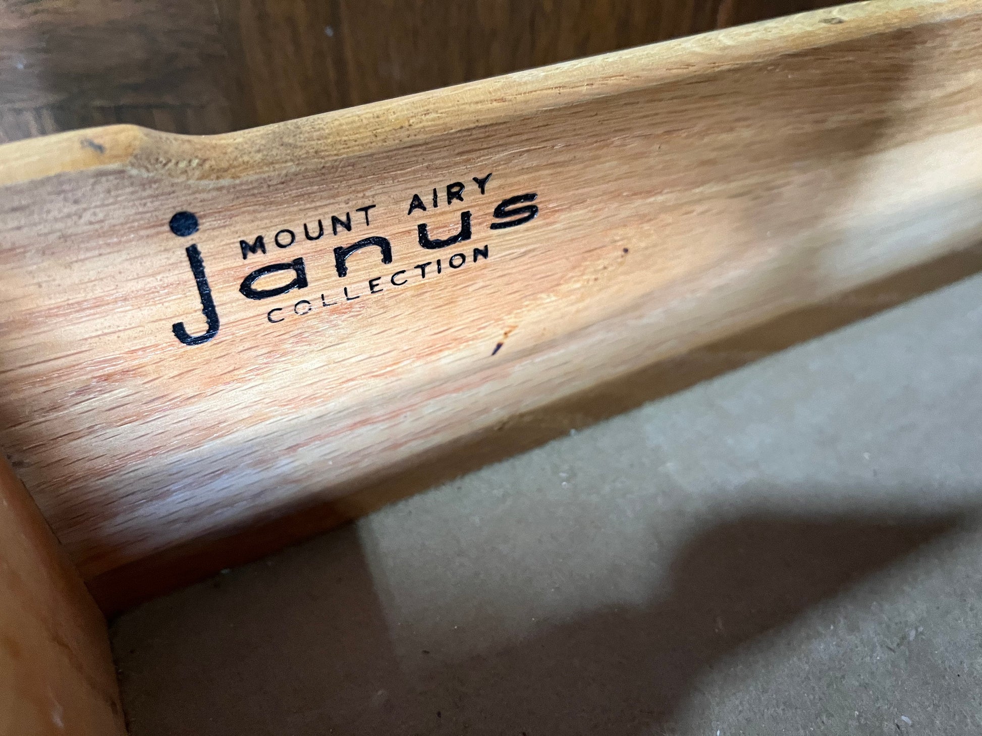 Detailed view of vintage buffet drawer showing label inside for authenticity