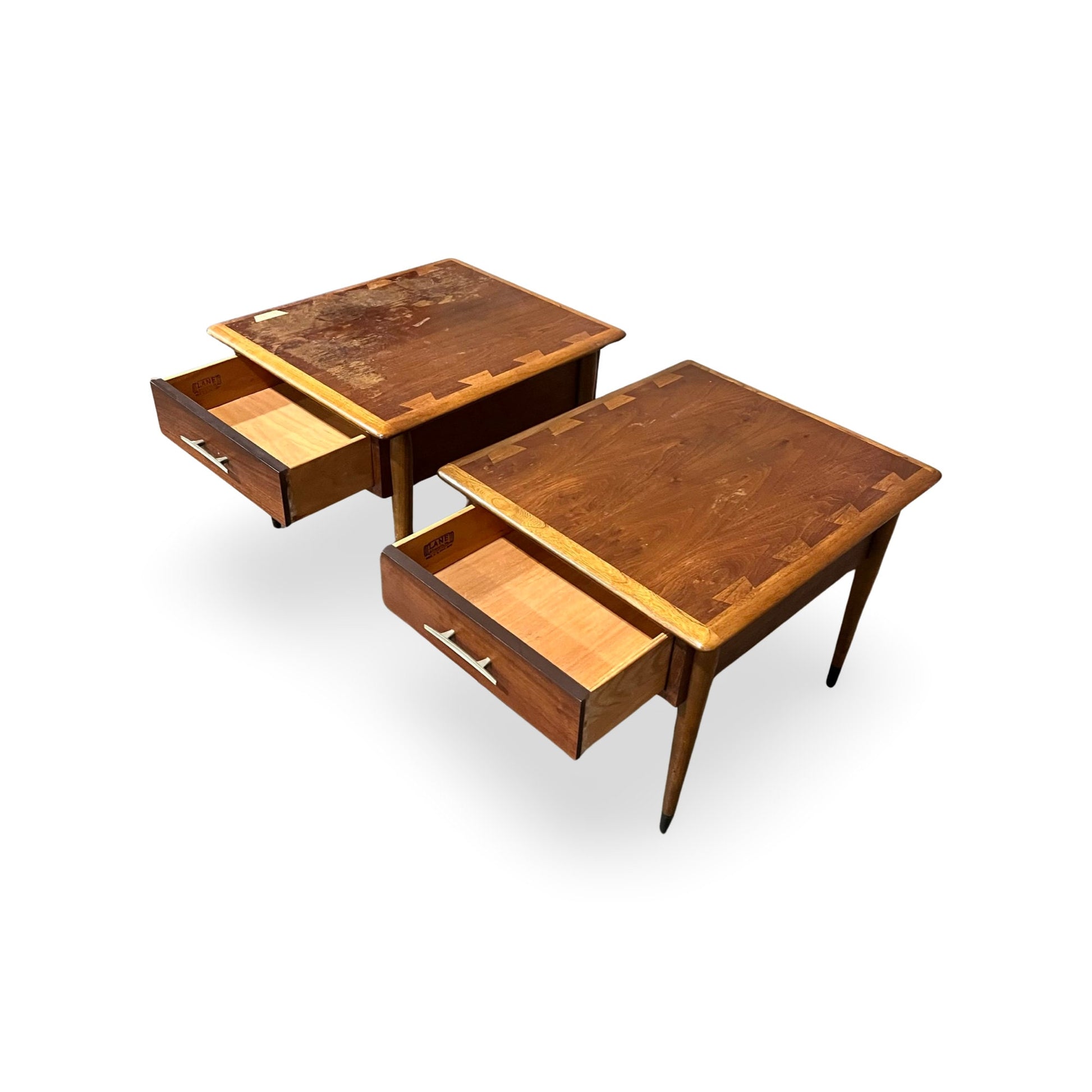 Timeless design Andre Bus end tables, reflecting 1960s craftsmanship and ingenuity.