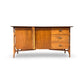 Vintage mid-century modern credenza with geometric prism wooden handles.